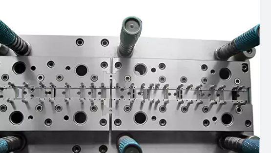 What is the difference between lifter and slide in injection molding